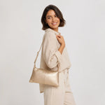 Bolso manos libres ventela de sintético para mujer - Oro