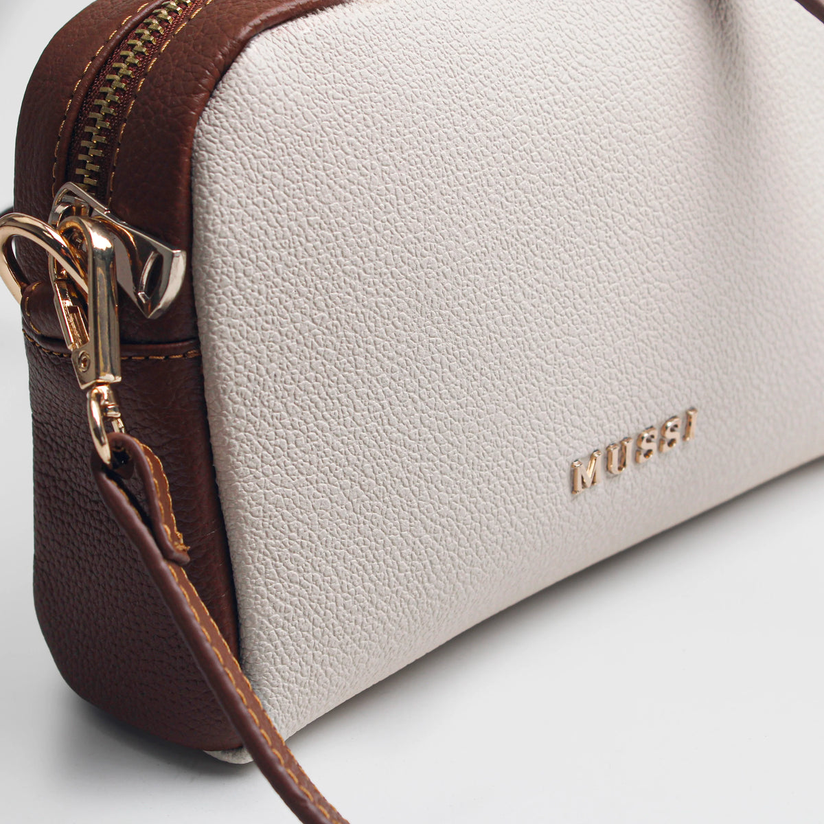 Bolso manos libres livia de cuero para mujer - Hueso