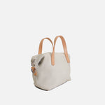 Bolso manos libres limon de cuero para mujer - Hueso