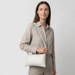 Bolso manos libres ventela de sintético para mujer - Hueso