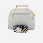 Bolso manos libres celeste de sintético para mujer - Hueso